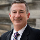 Bio image of H Lee Rhode III smiling