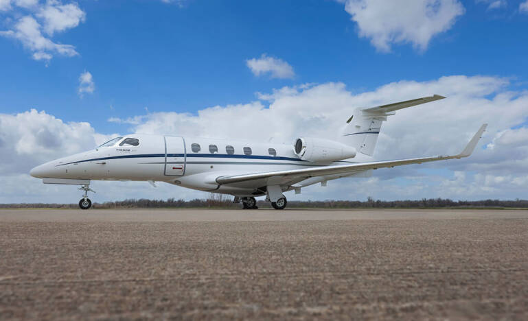 2012 Embraer Phenom 300 sideview