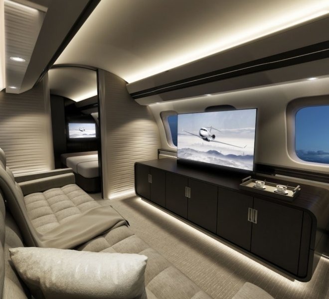 Interior of jet with large flat screen TV